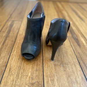 Black leather high heeled shoe